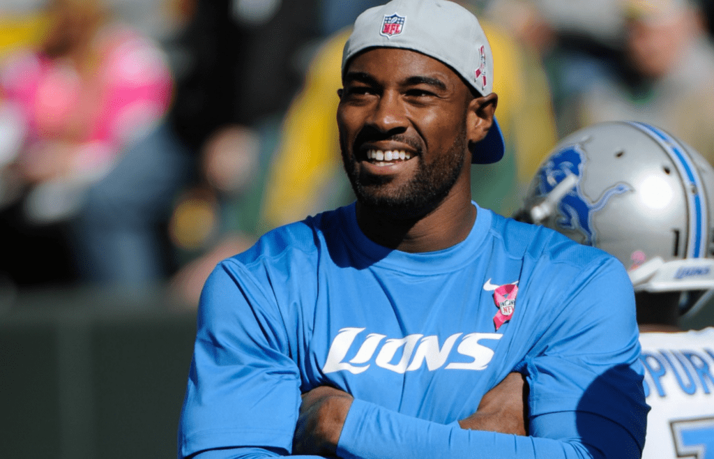 Oct 6, 2013; Green Bay, WI, USA; Detroit Lions wide receiver Calvin Johnson watches the Lions warm up before game against the Green Bay Packers at Lambeau Field. Johnson is inactive for the game with an injury. Mandatory Credit: Benny Sieu-Imagn Images