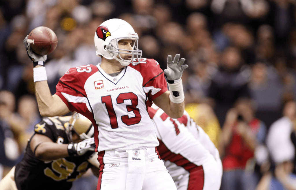 Jan. 16, 2010; New Orleans, LA, USA; Arizona Cardinals quarterback Kurt Warner (13) looks to pass against the New Orleans Saints during 3rd quarter at the Louisiana Superdome. The Saints defeated the Cardinals 45-14. Mandatory Credit: John David Mercer-Imagn Images