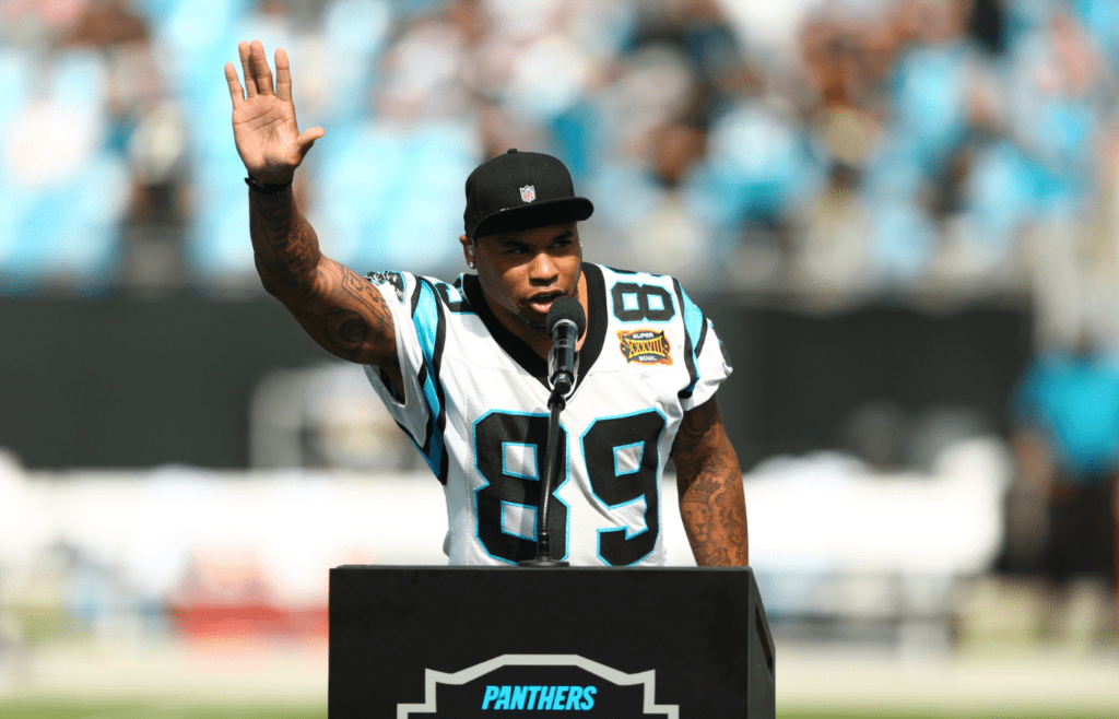 Oct 6, 2019; Charlotte, NC, USA; Former Carolina Panthers wide receiver Steve Smith Sr. speaks during the Hall of Honor ceremony during halftime against the Jacksonville Jaguars at Bank of America Stadium. Mandatory Credit: Jeremy Brevard-Imagn Images