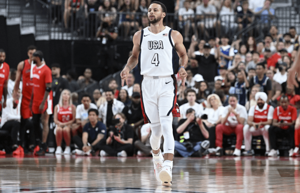 Jul 10, 2024; Las Vegas, Nevada, USA; USA guard Steph Curry (4) celebrates scoring on Canada during the first quarter of the USA Basketball Showcase at T-Mobile Arena. Mandatory Credit: Candice Ward-Imagn Images