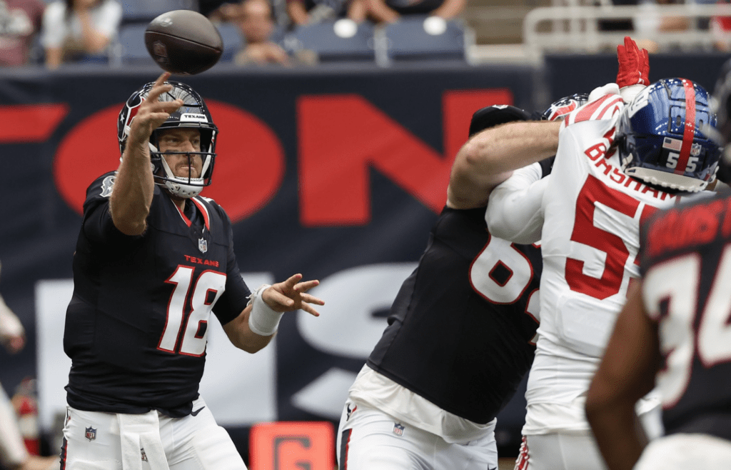 Aug 17, 2024; Houston, Texas, USA; Houston Texans quarterback Case Keenum (18) passes against the New York Giants in the third quarter at NRG Stadium. Mandatory Credit: Thomas Shea-Imagn Images