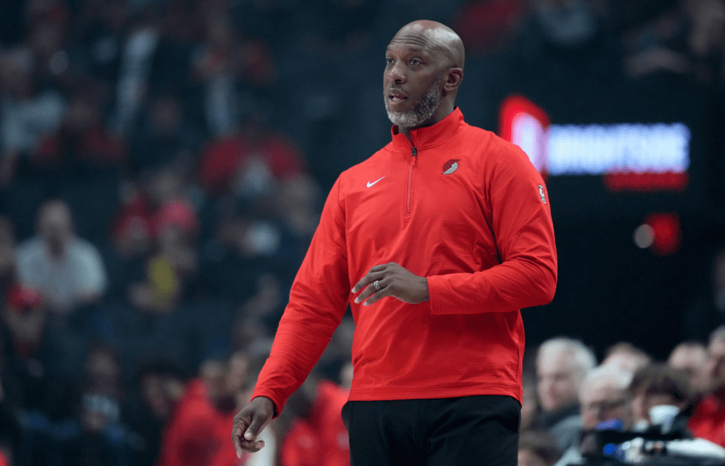 Apr 6, 2025; Portland, Oregon, USA; Portland Trail Blazers head coach Chauncey Billups watches from the sideline during the first half against the San Antonio Spurs at Moda Center. Mandatory Credit: Soobum Im-Imagn Images
