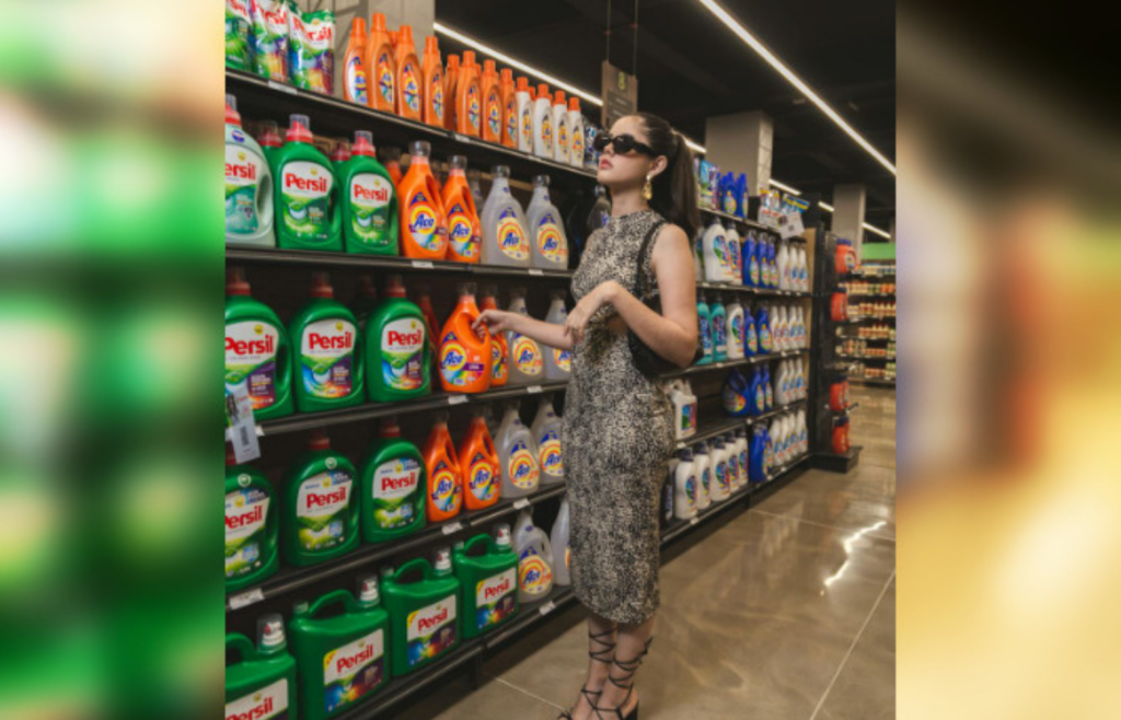 Woman checks every shelf for right detergent