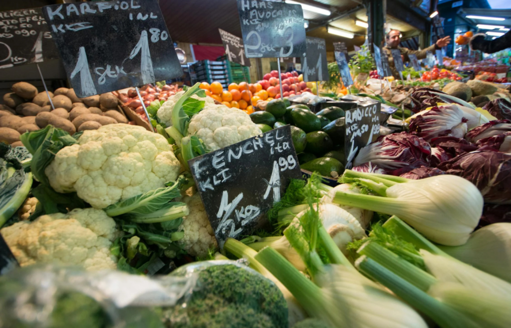 Fresh vegetables on display with price tags
