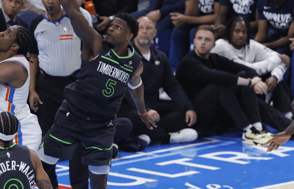 May 20, 2025; Oklahoma City, Oklahoma, USA; Oklahoma City Thunder forward Jalen Williams (8) drives against Minnesota Timberwolves guard Anthony Edwards (5) in the third quarter during game one of the western conference finals for the 2025 NBA Playoffs at Paycom Center. Mandatory Credit: Alonzo Adams-Imagn Images