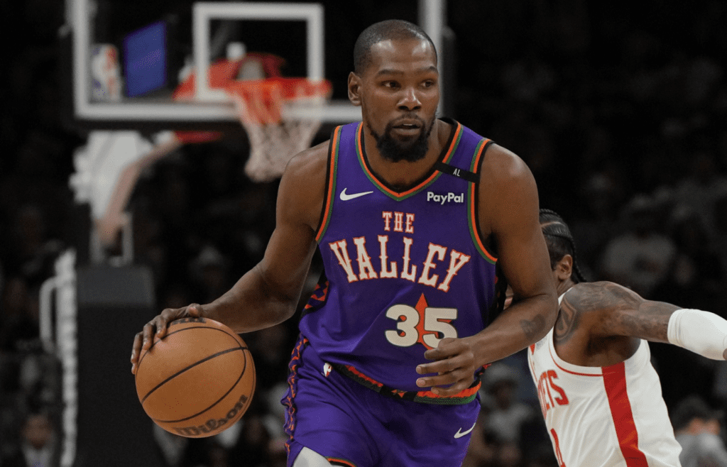 Mar 30, 2025; Phoenix, Arizona, USA; Phoenix Suns forward Kevin Durant (35) drives against the Houston Rockets in the first half at Footprint Center. Mandatory Credit: Rick Scuteri-Imagn Images