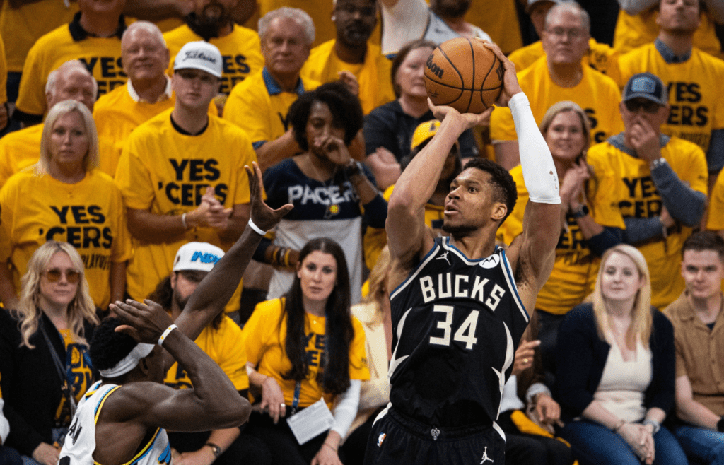 Apr 29, 2025; Indianapolis, Indiana, USA; Milwaukee Bucks forward Giannis Antetokounmpo (34) shoots the ball while Indiana Pacers forward Pascal Siakam (43) defends during game five of the first round for the 2024 NBA Playoffs at Gainbridge Fieldhouse. Mandatory Credit: Trevor Ruszkowski-Imagn Images