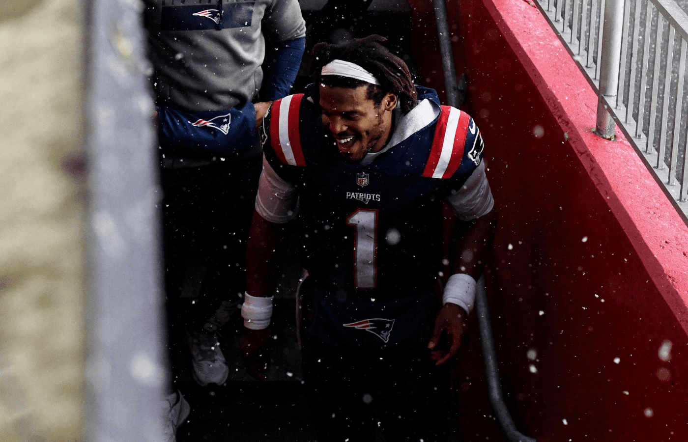 Jan 3, 2021; Foxborough, Massachusetts, USA; New England Patriots quarterback Cam Newton (1) walks to the lock room after a game against the New York Jets at Gillette Stadium. Mandatory Credit: Brian Fluharty-Imagn Images