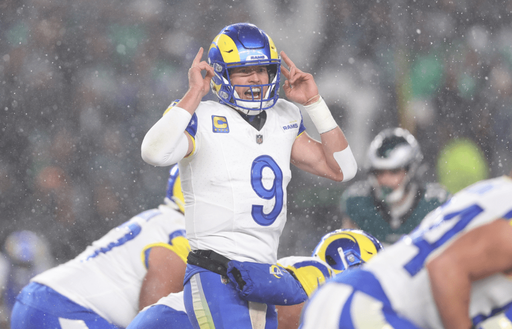 Jan 19, 2025; Philadelphia, Pennsylvania, USA; Los Angeles Rams quarterback Matthew Stafford (9) calls a play from the line of scrimmage in the third quarter against the Philadelphia Eagles in a 2025 NFC divisional round game at Lincoln Financial Field. Mandatory Credit: Bill Streicher-Imagn Images