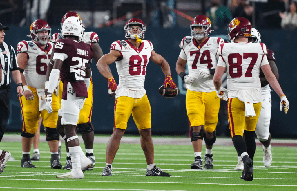 Dec 27, 2024; Las Vegas, NV, USA; Southern California Trojans wide receiver Kyle Ford (81) celebrates after a first down against the Texas A&M Aggies in the second half at Allegiant Stadium. Mandatory Credit: Kirby Lee-Imagn Images