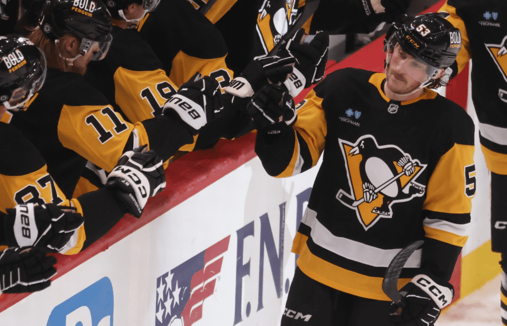 Apr 17, 2025; Pittsburgh, Pennsylvania, USA; Pittsburgh Penguins center Philip Tomasino (53) celebrates his goal with the Penguins bench against the Washington Capitals during the third period at PPG Paints Arena. Mandatory Credit: Charles LeClaire-Imagn Images