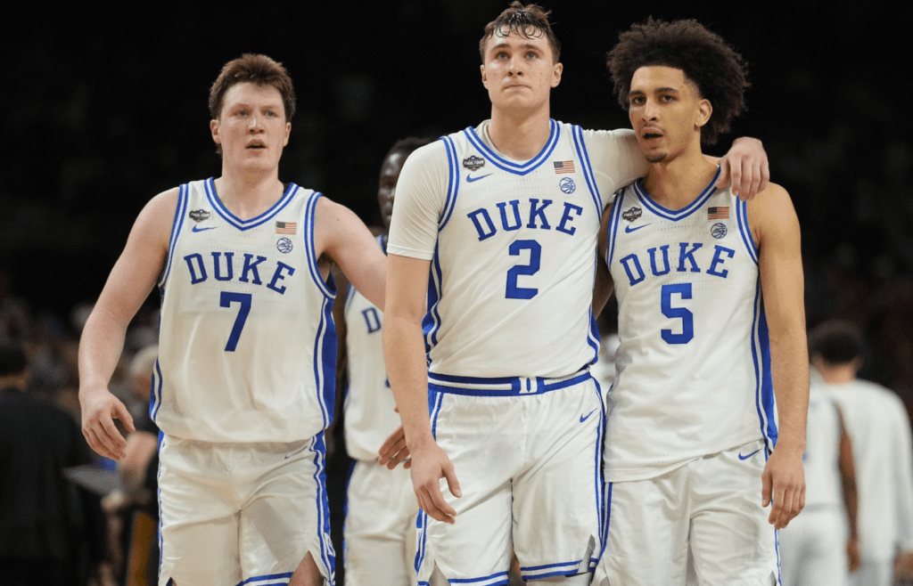 Apr 5, 2025; San Antonio, TX, USA; Duke Blue Devils forward Cooper Flagg (2) and Duke Blue Devils guard Tyrese Proctor (5) react against the Houston Cougars in the semifinals of the men's Final Four of the 2025 NCAA Tournament at the Alamodome. Mandatory Credit: Robert Deutsch-Imagn Images
