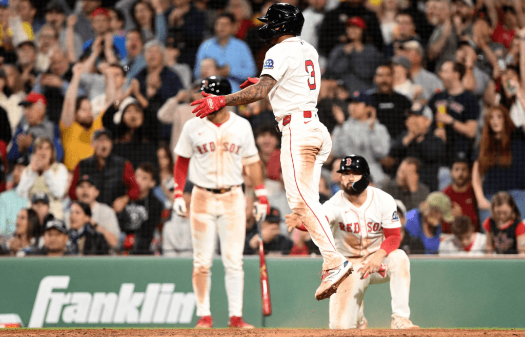 May 7, 2025; Boston, Massachusetts, USA; Boston Red Sox center fielder Ceddanne Rafaela (3) reacts after scoring a run against the Texas Rangers during the seventh inning at Fenway Park. Mandatory Credit: Brian Fluharty-Imagn Images