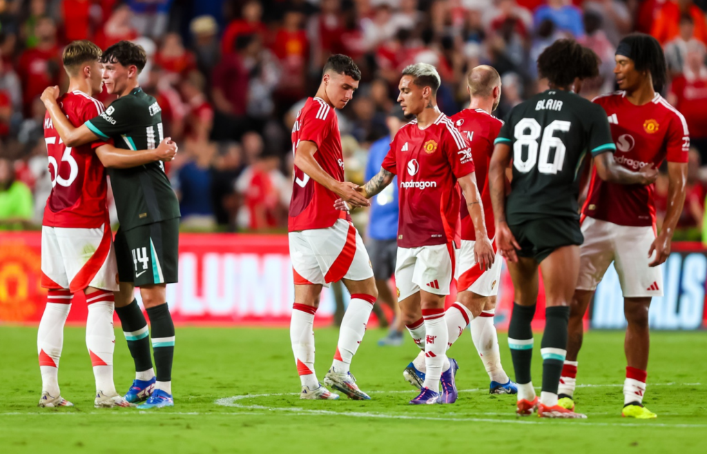 Aug 3, 2024; Columbia, South Carolina, USA; Liverpool and Manchester United players shake hands following their match at Williams-Brice Stadium. Mandatory Credit: Jeff Blake-Imagn Images