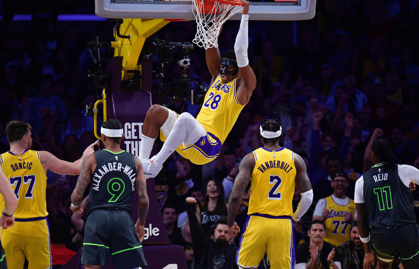 Apr 30, 2025; Los Angeles, California, USA; Los Angeles Lakers forward Rui Hachimura (28) dunks for the basket against the Minnesota Timberwolves during the second half in game five of first round for the 2025 NBA Playoffs at Crypto.com Arena. Mandatory Credit: Gary A. Vasquez-Imagn Images