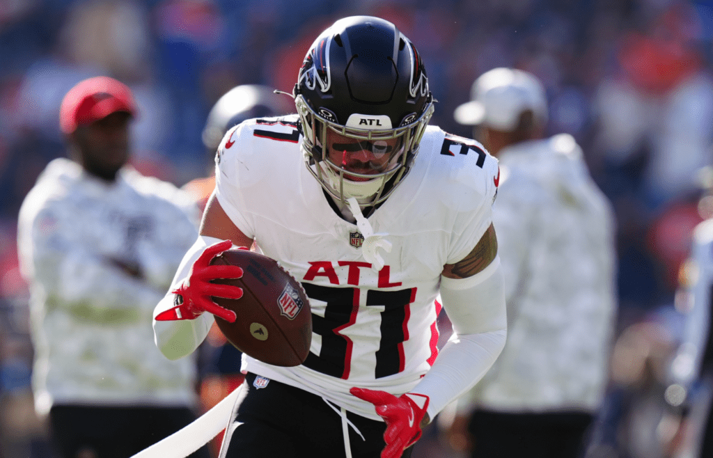 Nov 17, 2024; Denver, Colorado, USA; Atlanta Falcons safety Justin Simmons (31) warms up before the game against the Denver Broncos at Empower Field at Mile High. Mandatory Credit: Ron Chenoy-Imagn Images