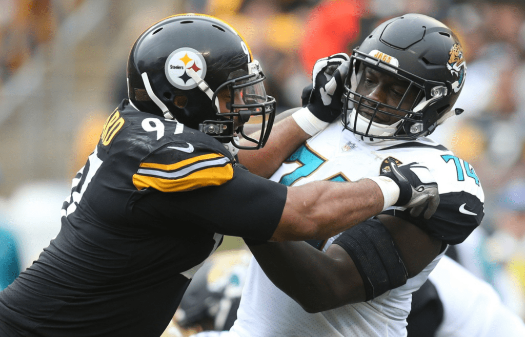Oct 8, 2017; Pittsburgh, PA, USA; Pittsburgh Steelers defensive end Cameron Heyward (97) blocks against Jacksonville Jaguars offensive tackle Cam Robinson (74) at the line of scrimmage during the second quarter at Heinz Field. The Jaguars won 30-9. Mandatory Credit: Charles LeClaire-Imagn Images