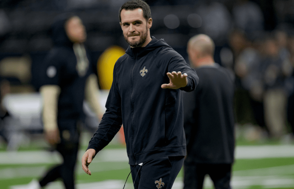 Dec 29, 2024; New Orleans, Louisiana, USA; New Orleans Saints quarterback Derek Carr (4) walks the field before a game against the Las Vegas Raiders at Caesars Superdome. Mandatory Credit: Matthew Hinton-Imagn Images