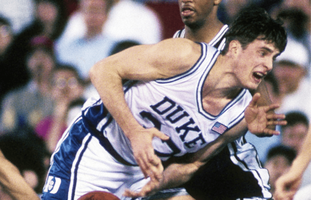 Mar 22, 1991; Pontiac, MI, USA; FILE PHOTO; Connecticut Huskies guard Chris Smith (13) knocks the ball loose from Duke Blue Devils forward Christian Laettner (32) during the 1991 NCAA Tournament at the Silverdome. Duke defeated Connecticut 81-67. Mandatory Credit: MPS-Imagn Images