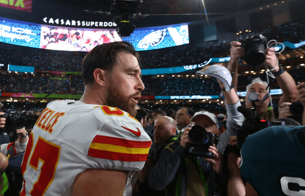 Feb 9, 2025; New Orleans, LA, USA; Kansas City Chiefs tight end Travis Kelce (87) reacts on the field after losing to the Philadelphia Eagles in Super Bowl LIX at Ceasars Superdome. Mandatory Credit: Mark J. Rebilas-Imagn Images