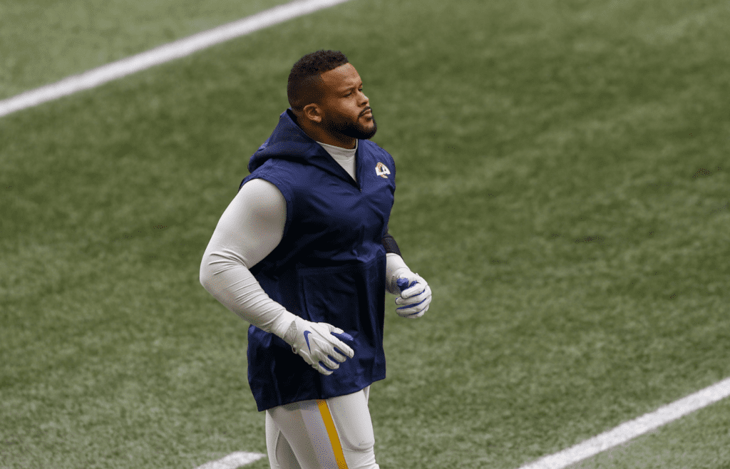 Dec 27, 2020; Seattle, Washington, USA; Los Angeles Rams defensive end Aaron Donald (99) warms up before the game against the Seattle Seahawks at Lumen Field. Mandatory Credit: Joe Nicholson-Imagn Images