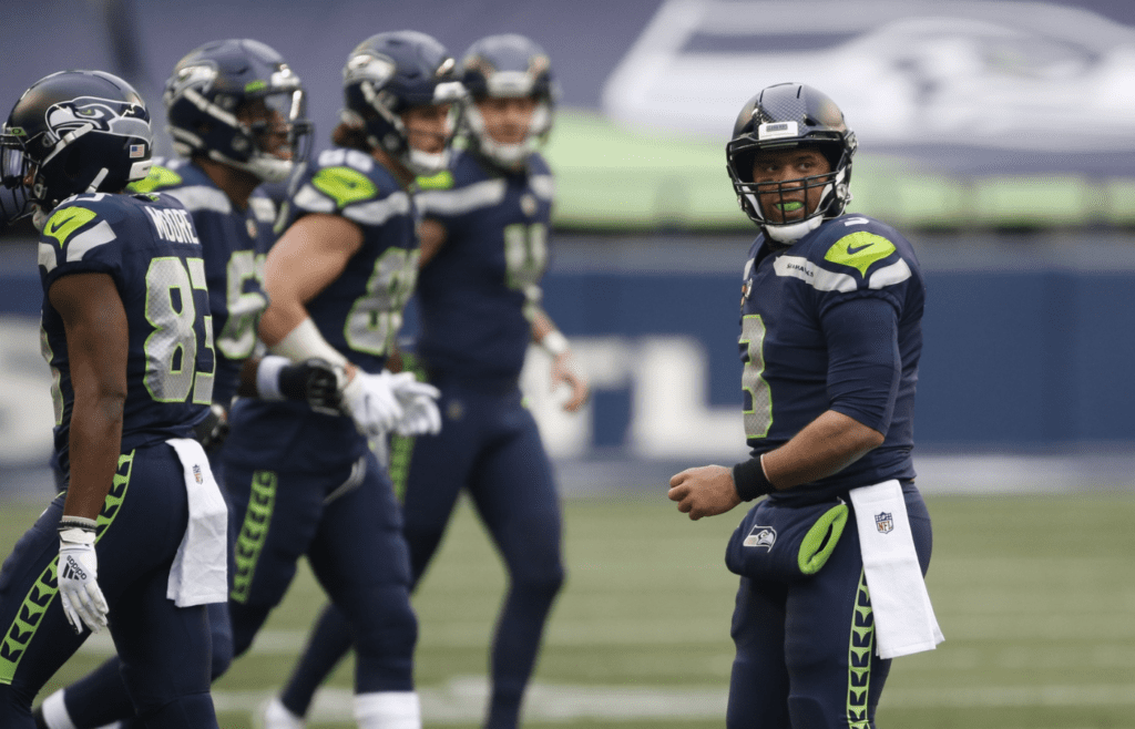 Jan 9, 2021; Seattle, Washington, USA; Seattle Seahawks quarterback Russell Wilson (3) looks on while walking to the sidelines against the Los Angeles Rams during the second quarter at Lumen Field. Mandatory Credit: Joe Nicholson-Imagn Images