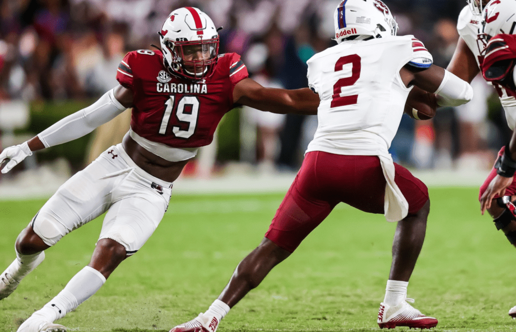 Sep 29, 2022; Columbia, South Carolina, USA; South Carolina Gamecocks linebacker Brad Johnson (19) pressures South Carolina State Bulldogs quarterback Corey Fields (2) in the first quarter at Williams-Brice Stadium. Mandatory Credit: Jeff Blake-Imagn Images