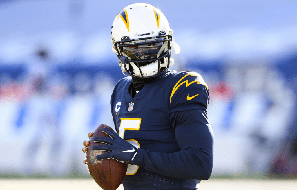 Nov 29, 2020; Orchard Park, New York, USA; Los Angeles Chargers quarterback Tyrod Taylor (5) warms up prior to the game against the Buffalo Bills at Bills Stadium. Mandatory Credit: Rich Barnes-Imagn Images