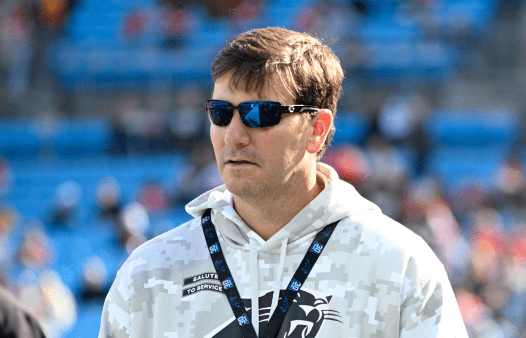 Nov 24, 2024; Charlotte, North Carolina, USA; Former Carolina Panthers quarterback and current Panthers radio anylist, Jake Delhomme, on the sidelines before the game at Bank of America Stadium. Mandatory Credit: Bob Donnan-Imagn Images