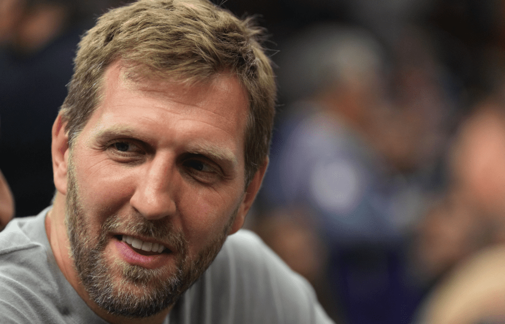 May 2, 2022; Phoenix, Arizona, USA; Former Dallas Mavericks player Dirk Nowitzki looks on during the first half of game one of the second round for the 2022 NBA playoffs against the Phoenix Suns at Footprint Center. Mandatory Credit: Joe Camporeale-Imagn Images