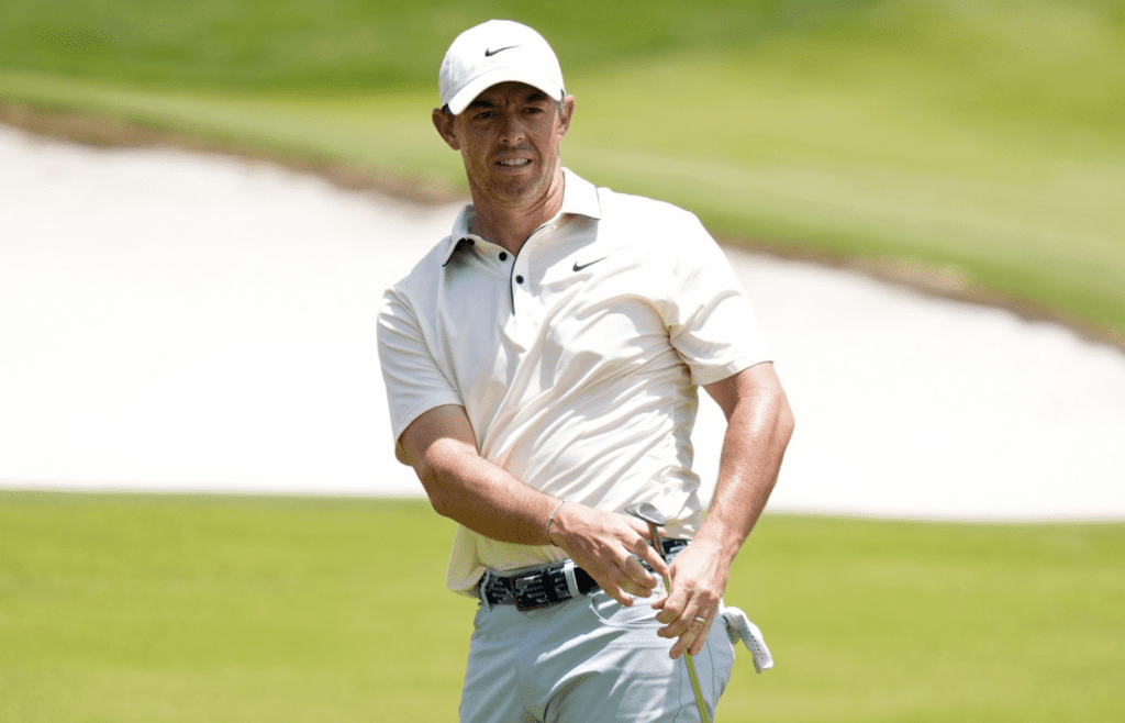 May 18, 2025; Charlotte, North Carolina, USA; Rory McIlroy watches his shot on the 15th hole during the final round of the PGA Championship golf tournament at Quail Hollow. Mandatory Credit: Jim Dedmon-Imagn Images