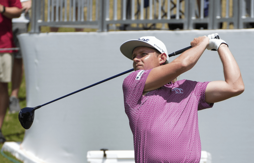 Aug 14, 2022; Memphis, Tennessee, USA; Cam Smith plays from the first tee during the final round of the FedEx St. Jude Championship golf tournament at TPC Southwind. Mandatory Credit: David Yeazell-Imagn Images