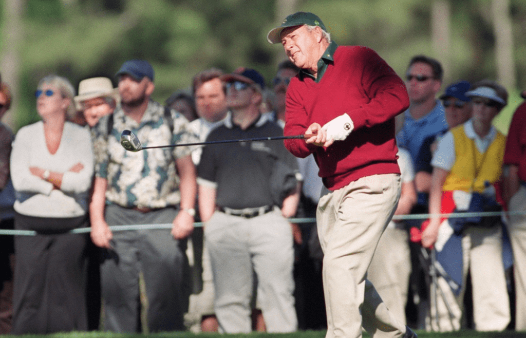 Arnold Palmer tees off during a game with Jack Nicklaus at the King & the Bear course, which the two golfers helped design, on March 26, 2001.