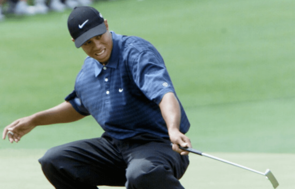 Tiger Woods reacts to missing a birdie put on the 2nd hole in round 3 of the Masters Tournament Saturday at the Augusta National Golf Club on April 7, 2001