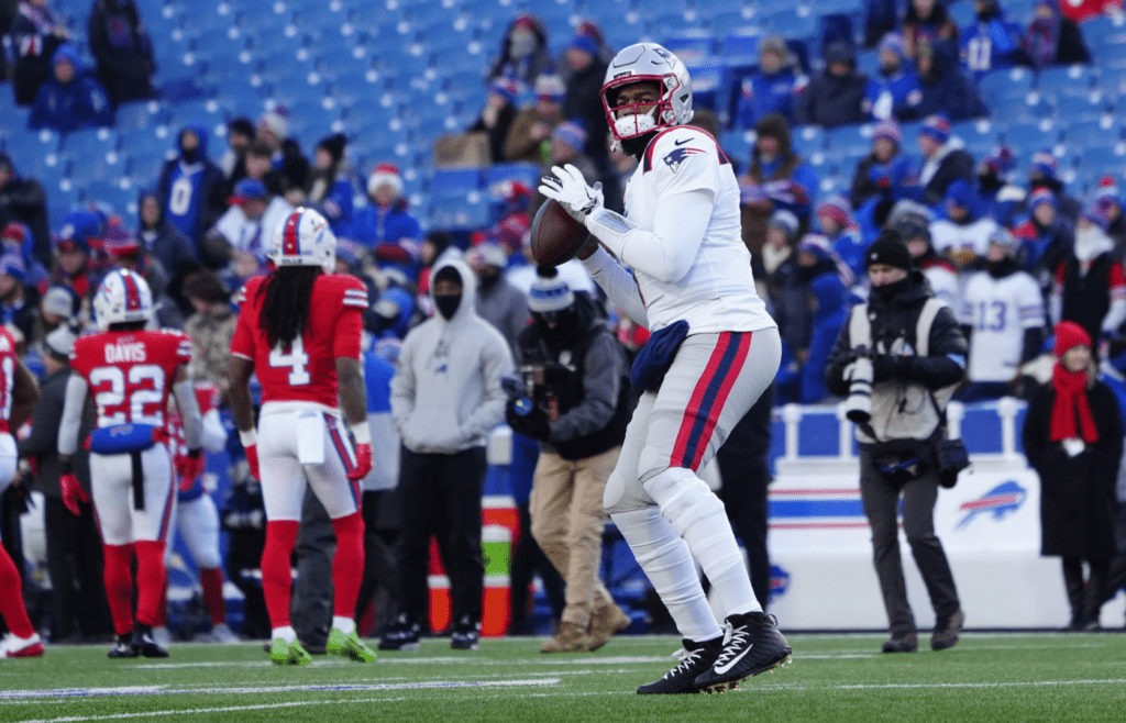 Dec 22, 2024; Orchard Park, New York, USA; New England Patriots quarterack Jacoby Brissett (7) warms up prior to the game against the Buffalo Bills at Highmark Stadium. Mandatory Credit: Gregory Fisher-Imagn Images