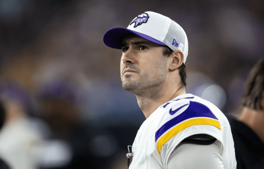 Jan 13, 2025; Glendale, AZ, USA; Minnesota Vikings quarterback Daniel Jones (13) against the Los Angeles Rams during an NFC wild card game at State Farm Stadium. Mandatory Credit: Mark J. Rebilas-Imagn Images