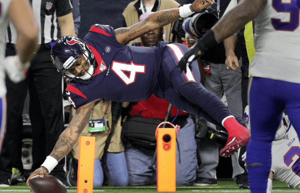Houston quarterback Deshaun Watson dives for the corner of the end zone to score on this two-point conversion. The Texans beat the Bills 22-19 in overtime