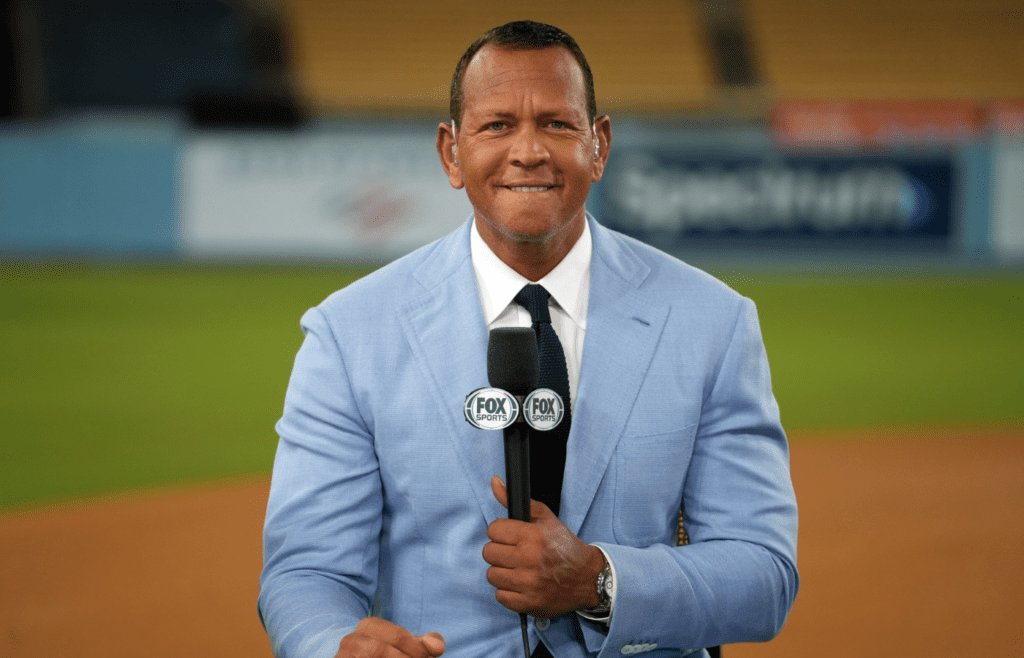 Oct 26, 2024; Los Angeles, California, USA; Fox Sports broadcaster Alex Rodriguez speaks on field after game two between the Los Angeles Dodgers and the New York Yankees in the 2024 MLB World Series at Dodger Stadium. Mandatory Credit: Kirby Lee-Imagn Images