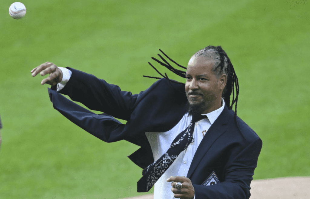 Aug 19, 2023; Cleveland, Ohio, USA; Former Cleveland player Manny Ramirez throws out a ceremonial first pitch after he was inducted to the team s hall of fame prior to a game against the Detroit Tigers at Progressive Field. Mandatory Credit: David Richard-Imagn Images