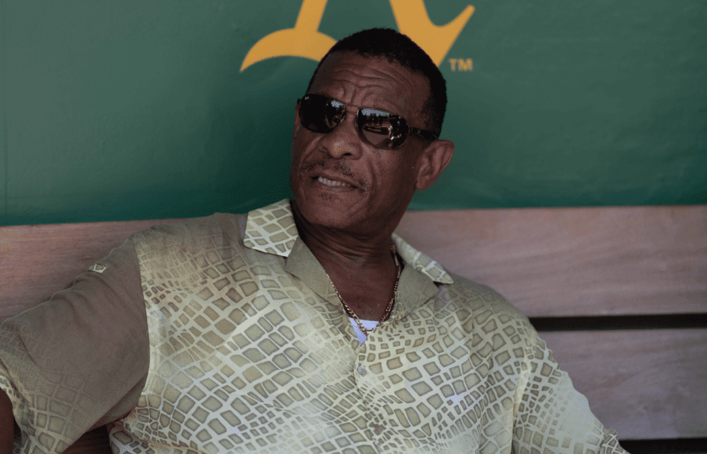 Aug 6, 2023; Oakland, California, USA; Retired baseball player Rickey Henderson before the induction of players for the Class of 2023 of the Oakland Athletics Hall of Fame. The ceremony was held before the start of the game between the Oakland Athletics and the San Francisco Giants at Oakland-Alameda County Coliseum. Mandatory Credit: Stan Szeto-Imagn Images