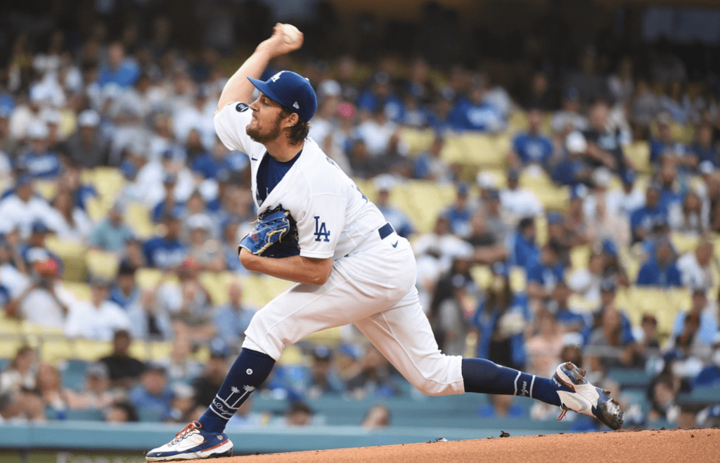 Jun 28, 2021; Los Angeles, California, USA; Los Angeles Dodgers starting pitcher Trevor Bauer (27) pitches against the San Francisco Giants in the first inning at Dodger Stadium. Mandatory Credit: Richard Mackson-Imagn Images