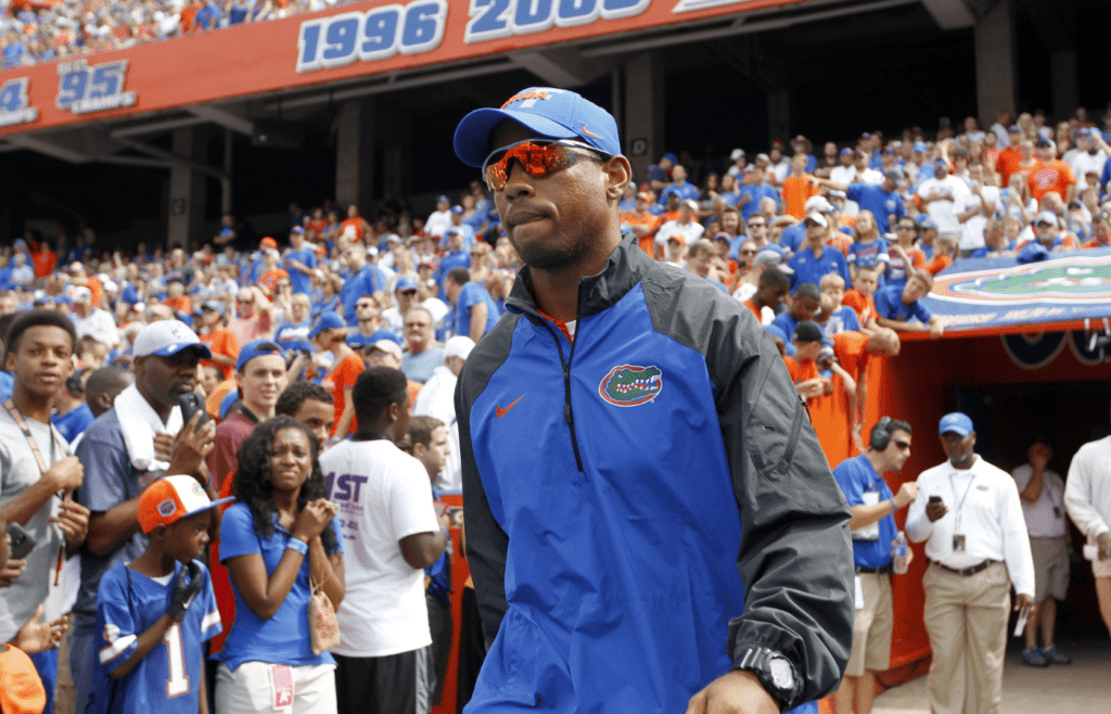 Sep 6, 2014; Gainesville, FL, USA; Florida Gators wide receivers coach Chris Leak walks onto the field during the first half against the Eastern Michigan Eagles at Ben Hill Griffin Stadium. Mandatory Credit: Kim Klement-Imagn Images