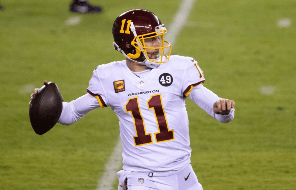 Jan 3, 2021; Philadelphia, Pennsylvania, USA; Washington Football Team quarterback Alex Smith (11) passes the ball against the Philadelphia Eagles during the third quarter at Lincoln Financial Field. Mandatory Credit: Bill Streicher-Imagn Images