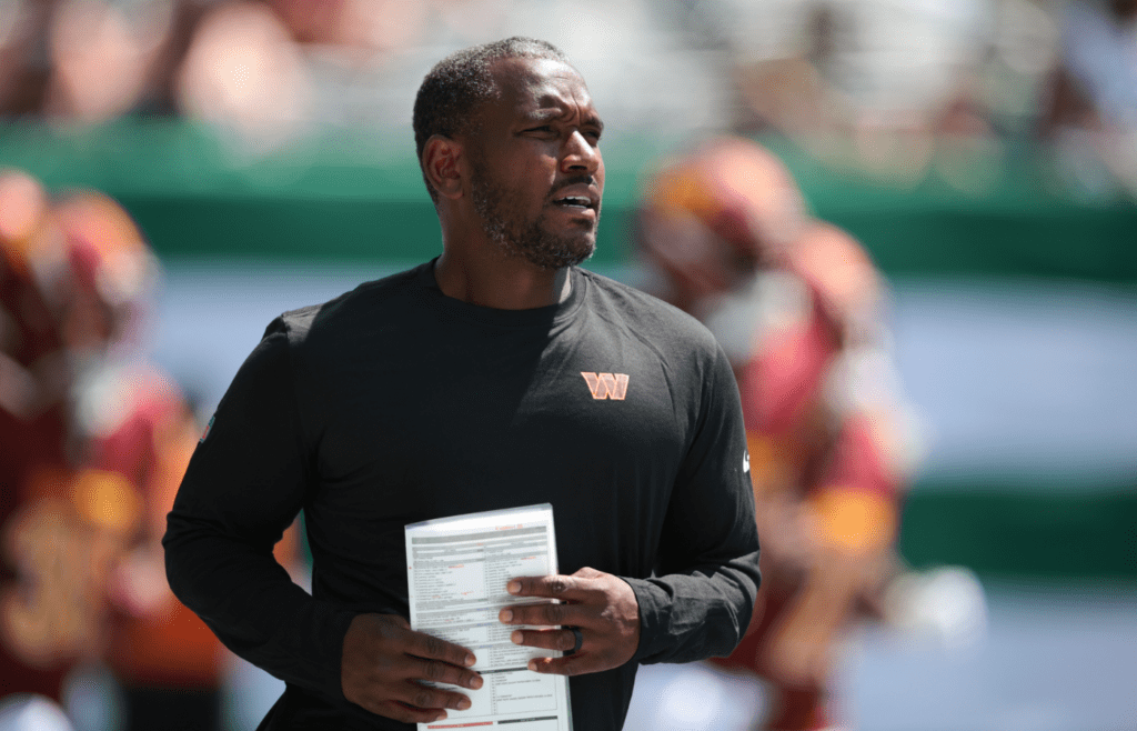 Aug 10, 2024; East Rutherford, New Jersey, USA; Washington Commanders wide receiver coach Bobby Engram before the game against the New York Jets at MetLife Stadium. Mandatory Credit: Vincent Carchietta-Imagn Images