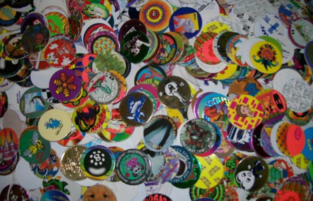 A collection of colorful pogs spread out