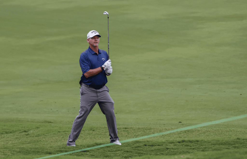 Aug 3, 2023; Greensboro, North Carolina, USA; Tommy Gainey watches his shot from the 9th fairway during the first round of the Wyndham Championship golf tournament. Mandatory Credit: David Yeazell-Imagn Images
