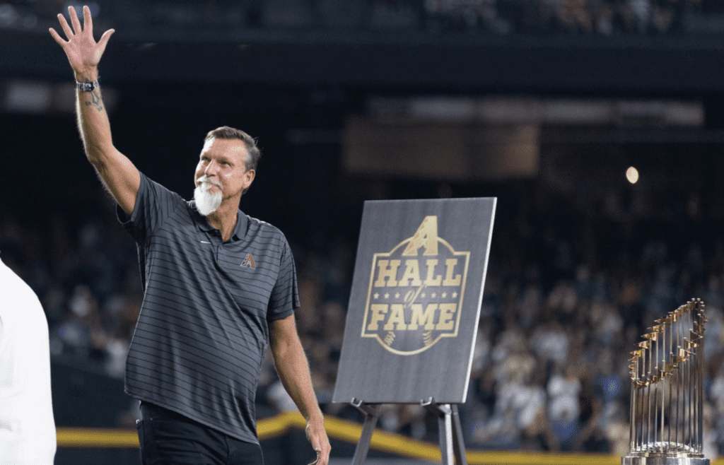 Randy Johnson waves before being inducted in to the Arizona Diamondbacks Hall of Fame on July 27, 2024 at Chase Field in Phoenix