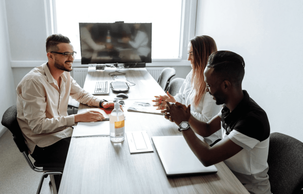 A person looking smug in a business meeting