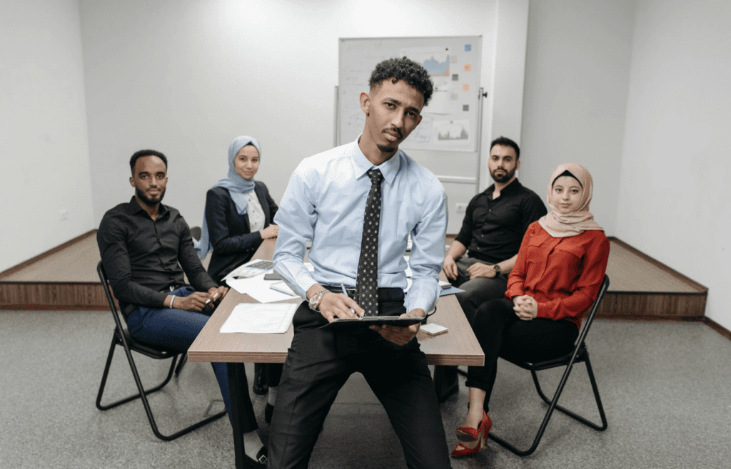 A person looking isolated during a group discussion