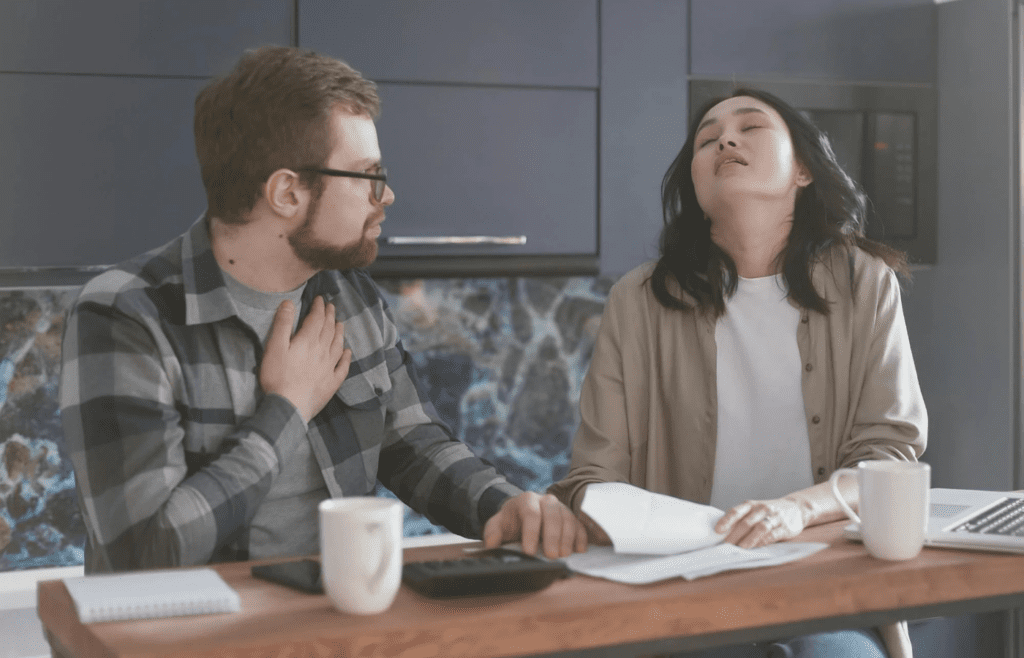 A couple mid-argument, one using guilt as leverage
